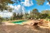 Swimming pool loungers relax Alaró Mallorca