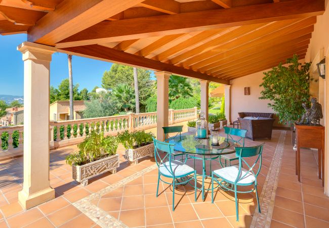 Covered outdoor dining area with views. Covered outdoor dining area with views.