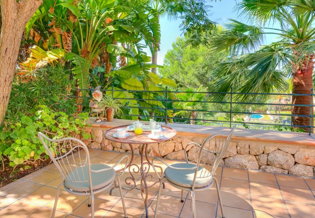 Balcony with views of the garden and pool. Balcony with views of the garden and pool.