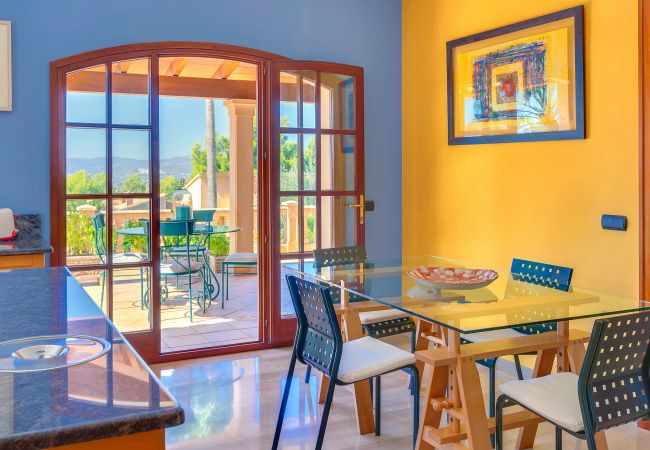 Villa Tierraseca Bunyola  Kitchen with natural light and a terrace.
