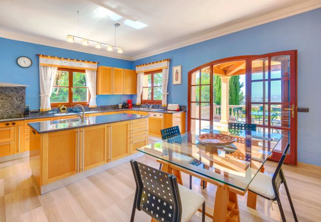 Kitchen with access to the balcony Kitchen with terrace and views
