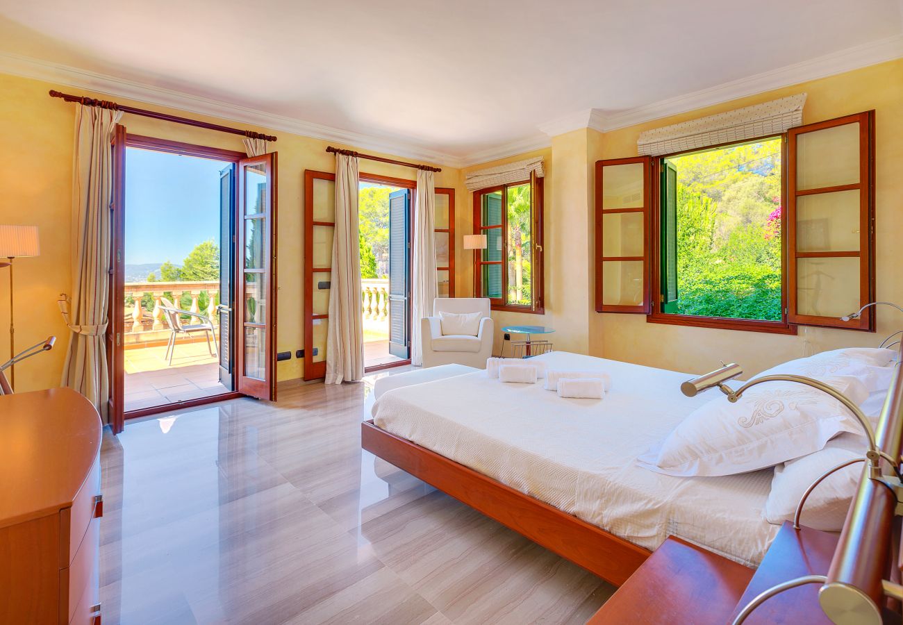 Villa Tierraseca Bunyola  Bedroom with great views of the mountains.