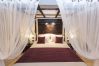 Bedroom canopy bed luxurious Villa Ibiza