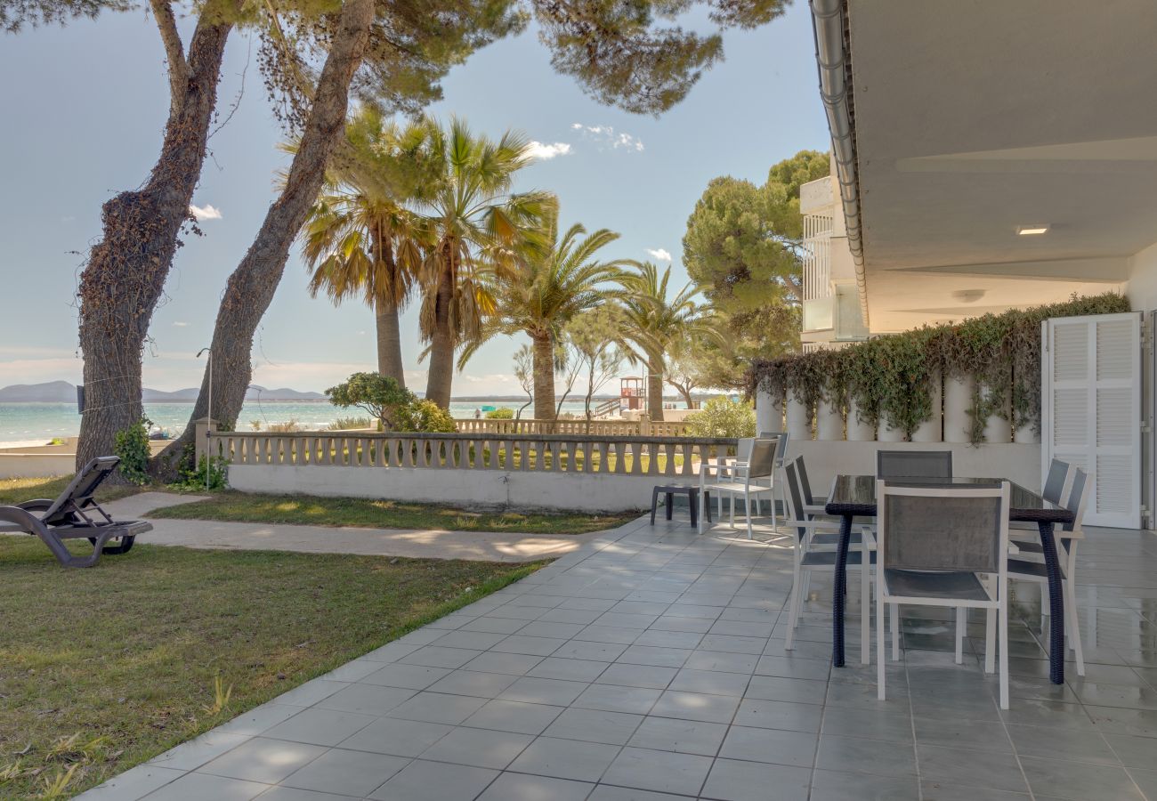 Terrace of Villa Garballo, on the first line in Alcudia, Mallorca Terrace first line holiday villa Alcudia Majorca