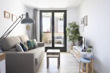 Living room and terrace of holiday apartment in Sitges